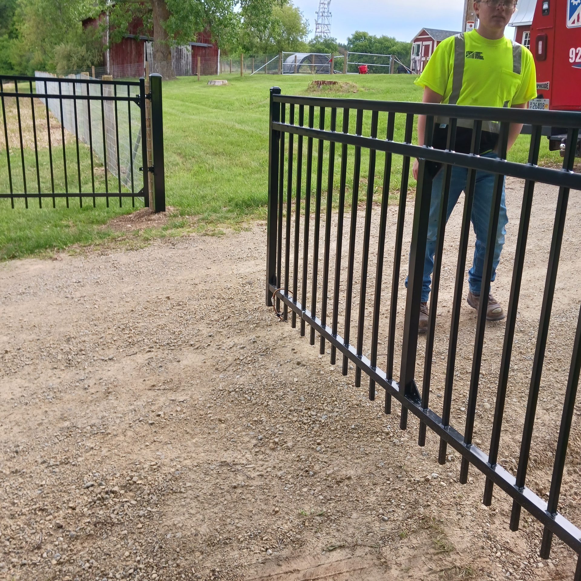pgos-technician-black-steel-slide-gate-installation